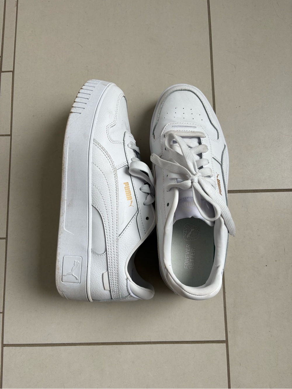 Puma White Sneakers with Subtle Green Insole Trim